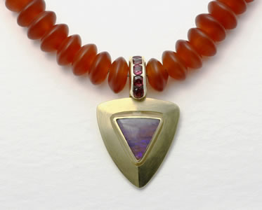 Opal pendant on cornelien lens shaped beads